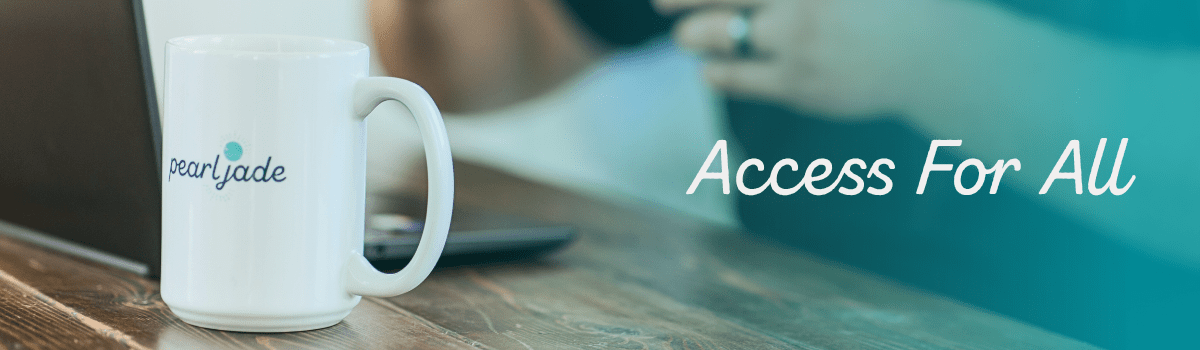 A white coffee mug with the logo “pearljade” sits on a wooden table next to a laptop. The background is softly blurred, showing a person using the laptop. The text “Access For All” appears on the right in light blue script.